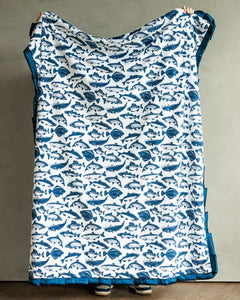 Minky Couture Fisher Blanket featuring playful blue fish designs on a white background.