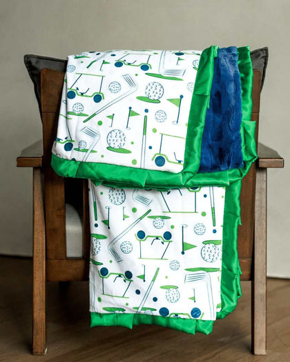 Minky Couture Tee-Time Blanket featuring a golf-themed print on a soft blue background, plush and cozy.