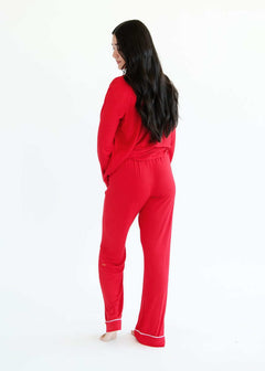 Model wearing Red Middle of the Night Pajamas, showcasing the back view with long sleeves and straight leg design.