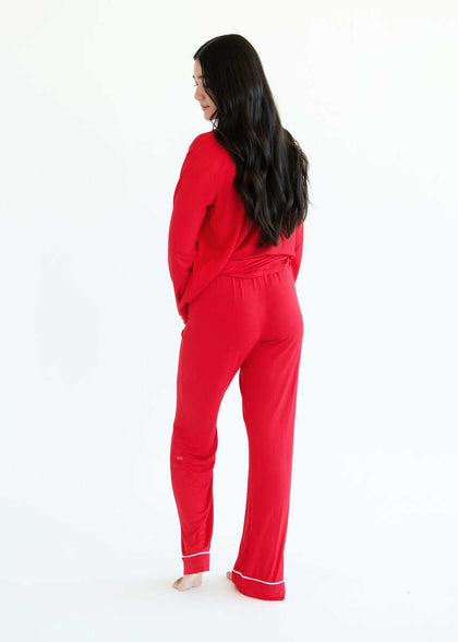 Model wearing Red Middle of the Night Pajamas, showcasing the back view with long sleeves and straight leg design.