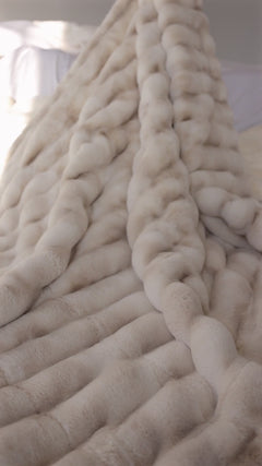 Minky Couture Extreme Ultra Cloud Ancient Scroll Blanket showcasing its soft tan hue and plush texture.