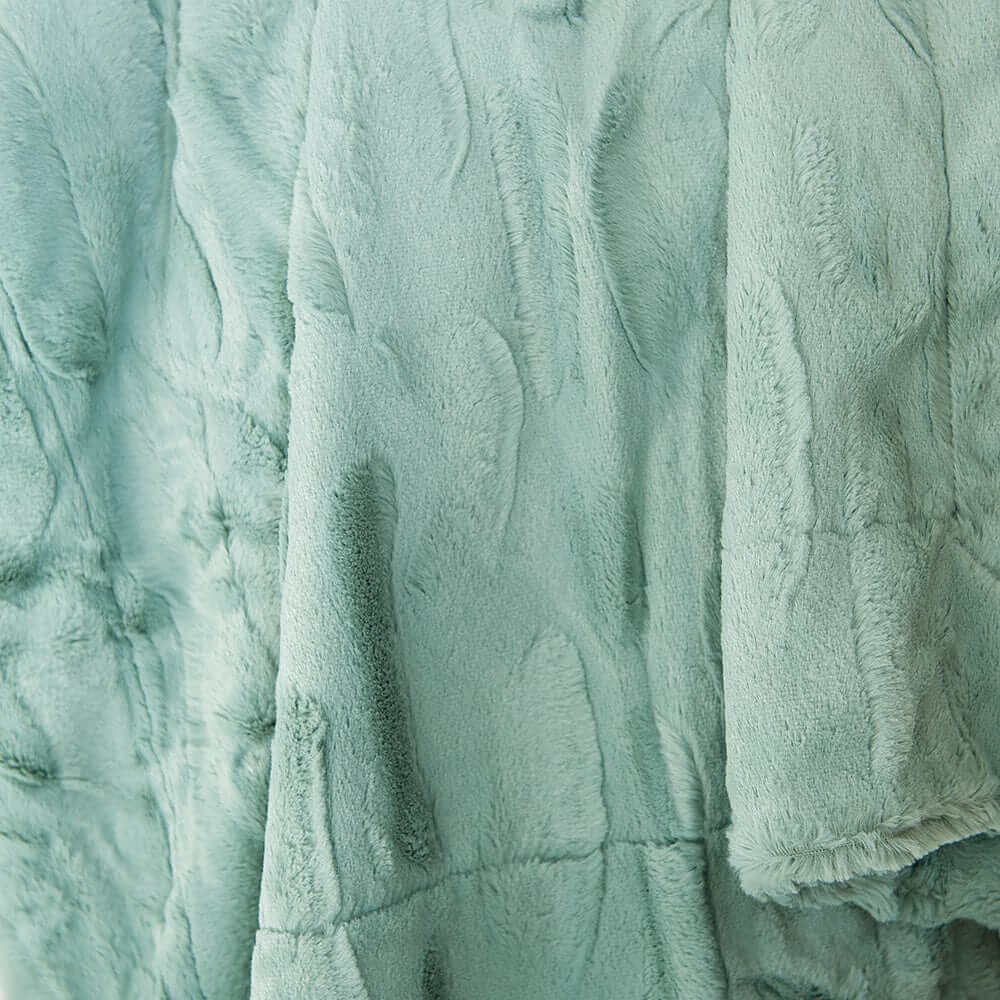 Close-up of the soft, textured Sorbet Mist Blanket in gentle green hue, ideal for a calming home atmosphere.