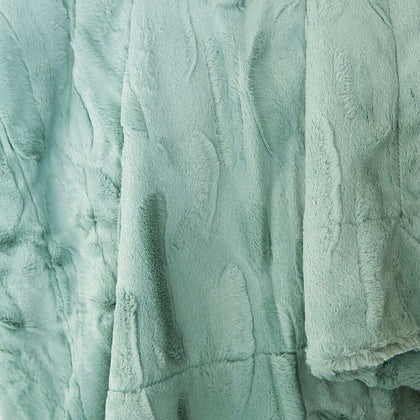 Close-up of the soft, textured Sorbet Mist Blanket in gentle green hue, ideal for a calming home atmosphere.
