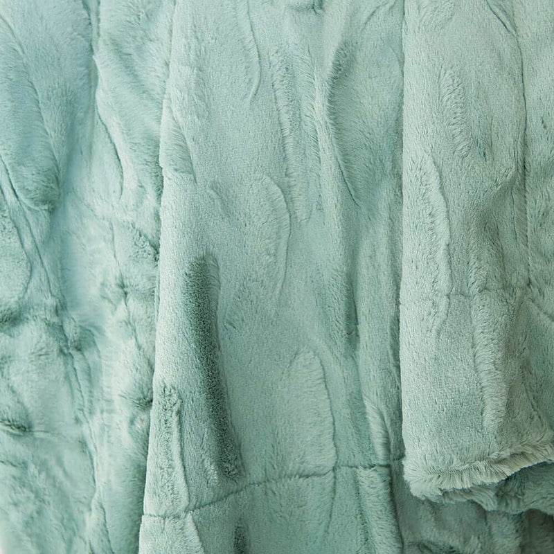 Close-up of the soft, textured Sorbet Mist Blanket in gentle green hue, ideal for a calming home atmosphere.