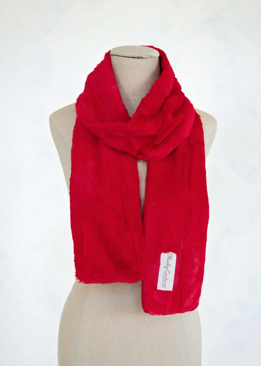 Bright red Sorbet Scarf displayed on a mannequin, featuring a smooth texture for casual and elegant wear.