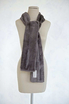 Sorbet Scarf displayed on a mannequin in charcoal color, showcasing its smooth texture and elegant style.