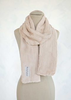 Light and elegant Sorbet Scarf displayed on a mannequin, featuring a smooth minky texture in soft Almond Croissant color.