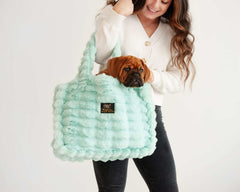 Ripple Tiffany Annie Bag, stylish bag with dog inside, showcasing luxury and versatility in fashion.
