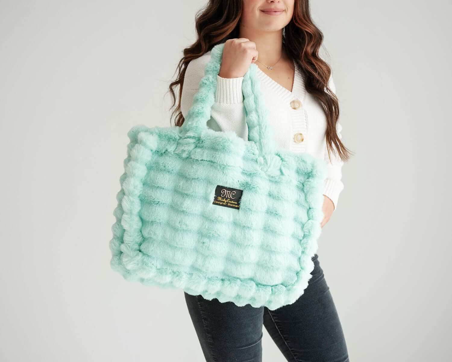 Ripple Tiffany Annie Bag in a mint color, showcasing luxurious texture and style, perfect for any occasion.
