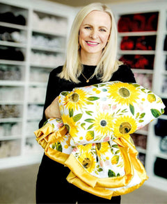 Woman standing holding a yellow watercolor sunflower Little Miss Sunshine Blanket