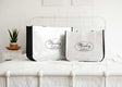 Two Minky Couture reusable Shopping Bags displayed on a bed, showcasing their design and versatility for various uses.