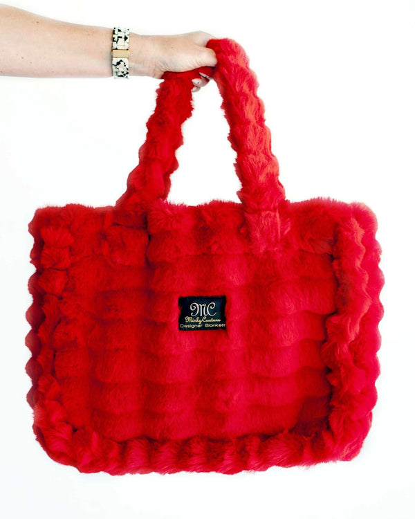 Annie Bag Ripple Red, a luxurious red accessory with fluffy texture, perfect for stylish on-the-go looks.